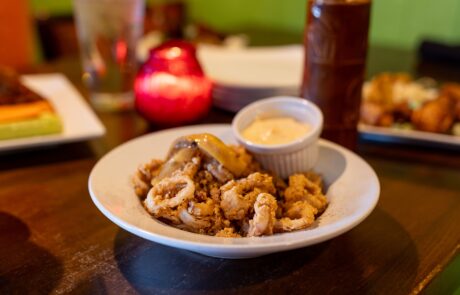 Fried calamari with a side of sauce