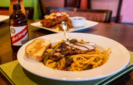 Chicken Rasta Pasta with a side of garlic bread