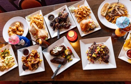 A table full of entrees at the Whistling Bird